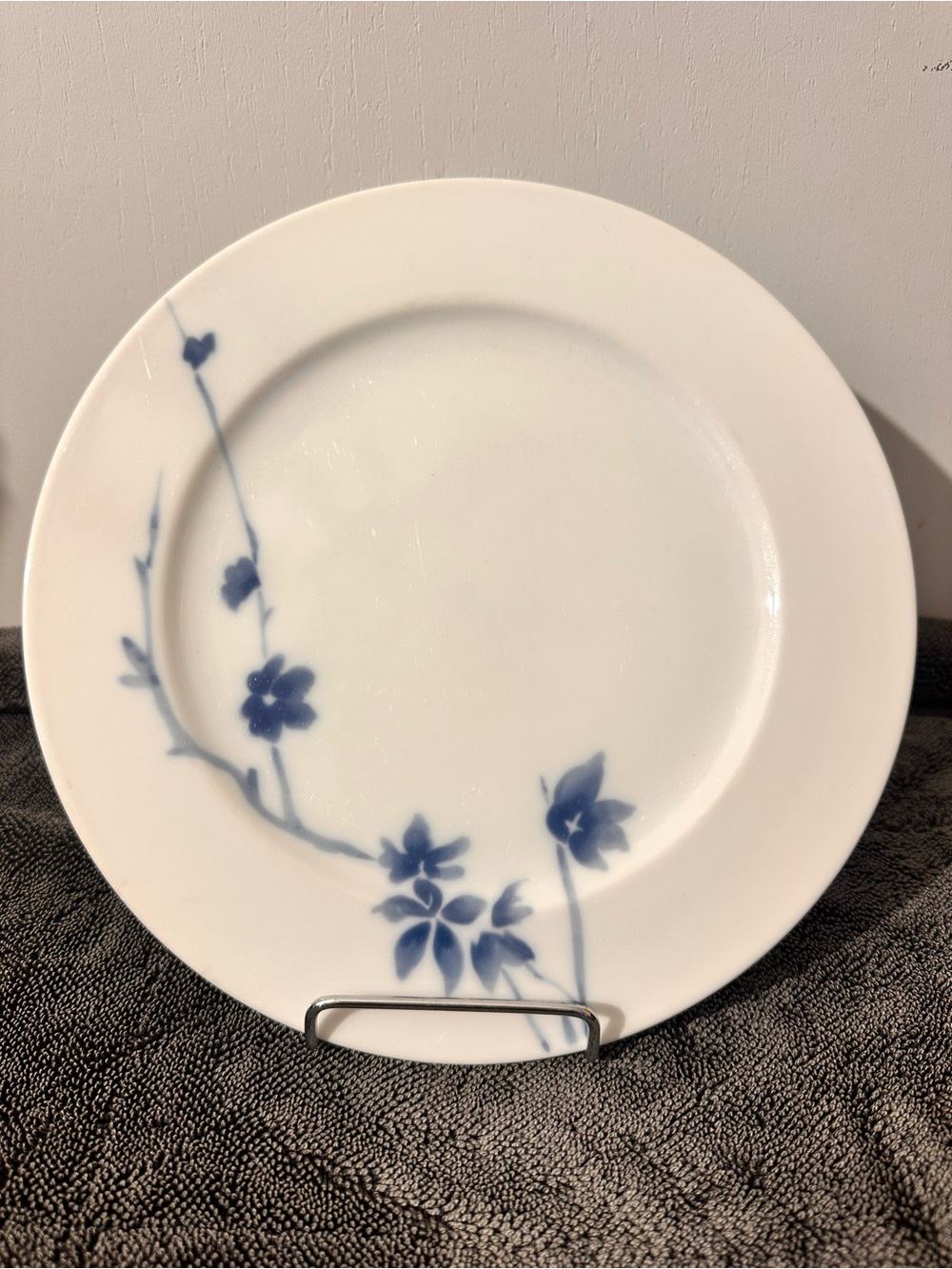 White Porcelain Dinner Plate with Blue Floral Accent